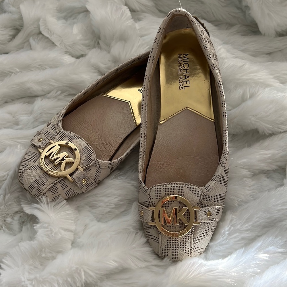 Michael Kors flats. Great to wear to dress up or down!
